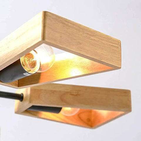 Slick Modern Metal Five Light Ceiling Pendant With E27 Socket Bulb Compatibility For Living Spaces And Dining Areas Heavy Duty Hanging Fixture with wooden details.