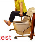 User demonstrating Heavy Duty Toilet Safety Rails With Adjustable Support Leg For Seniors, built on toilet, stainless steel frame.