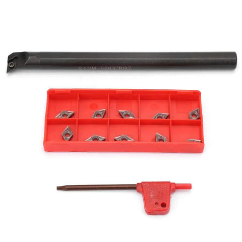 Lathe Grooving Turning Tool Holder with DCMT0702 Carbide Inserts and red wrench set on a white background.