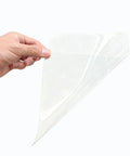 Hand holding Pro Grade A4 PET Sublimation Film 8.3 By 11.7 Inches 3D Heat Transfer Film Matte Clear PreTreat Sheets