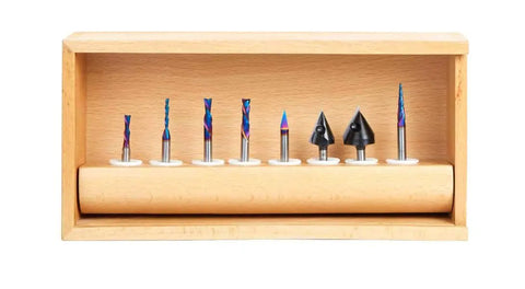 Kickass Eight Piece Router Bit Set With One Quarter Inch Shanks And Bulletproof Ceramic Coating for CNC cuts in a wooden box.