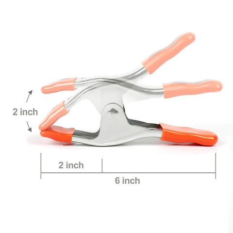 Side view: PONY 6-inch heavy-duty spring clamp with orange rubber handles and 2-inch jaw opening