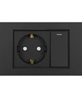 Straight Up Rock Solid EU Schuko Wall Socket Featuring A Smooth Tap Power Switch And Dead Simple USB Type C Charging Port Crafted From Scratch Proof Glass Panel For Modern Living Spaces, black design.