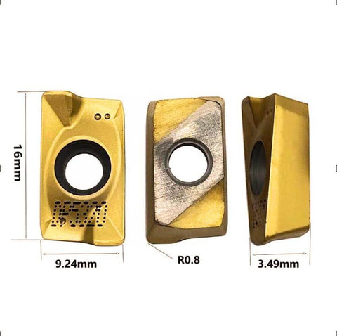 Three tin-coated APMT1604 carbide turning inserts with central hole, 9.24x16 mm, R0.8 radius.