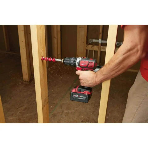 Heavy Duty Compact Hammer Drill Driver With Beefy 500 In Lbs Torque Output And Zero To One Eight Hundred Rpm Settings Featuring All Metal Gearcase Cordless Bare Tool Built Tough For Professional Jobsites drilling into wood framework.