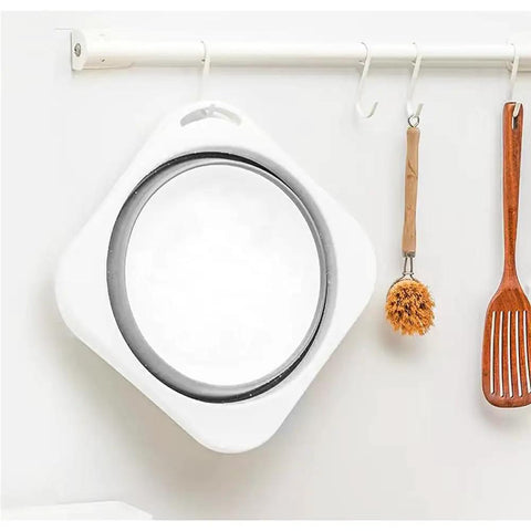 Road Trip Ready Lightweight Folding Wash Basin One Point Four Gallon Capacity No Fuss Bpa Free Plastic Soaking Tub For Dorm Life Camping Treks And Housework Tasks Matte Grey hanging on a hook.