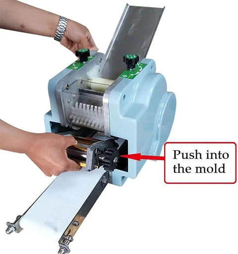 Zero Drama Automatic Dumpling Skin Maker and Stainless Steel Dough Press in use, highlighting dough feeding process for uniform wrappers.