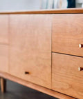 Mid-century dresser with Vintage Bronze Drawer Knobs Set Of Four, Solid Brass Cone Cabinet Pulls, antique finish, 0.79x0.98 inches.