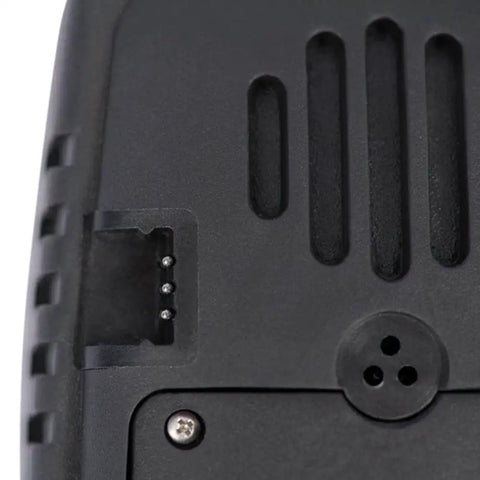 Close-up of the back of Pro Plus 4.0 Dive Computer with Compass, showing port connections for Bluetooth sync to DiverLog app.