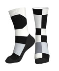Fresh Black And White Piano Grid Print Crew Socks For Men And Women Straight Up Comfy Polyester Athletic Hosiery showing distinct grid patterns.