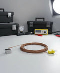 K Type Thermocouple Probe With 2 Pin Flat Mini Connector And 78 Inch Fiberglass Insulated Lead Ready To Roll Temperature Sensor For -58F To 752F Range Compatible With Most K Type Thermometers Controllers And Data Loggers coiled on table