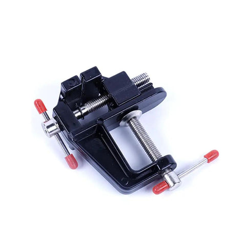 Compact Mini Vise Clamp With A Rock Solid Hold For Woodworking Carving And Jewelry Diy Tasks Dead Simple Table Clip Mount Black Finish side view of small black clamp with red handles