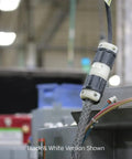 Close view of rugged 30 Amp 250 Volt NEMA L6-30P locking plug in use, industrial grade grounding with solid brass contacts.