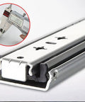 Close-up of Heavy Duty Steel Drawer Slides 300mm showcasing measured width with caliper, side mount for secure cabinet use.
