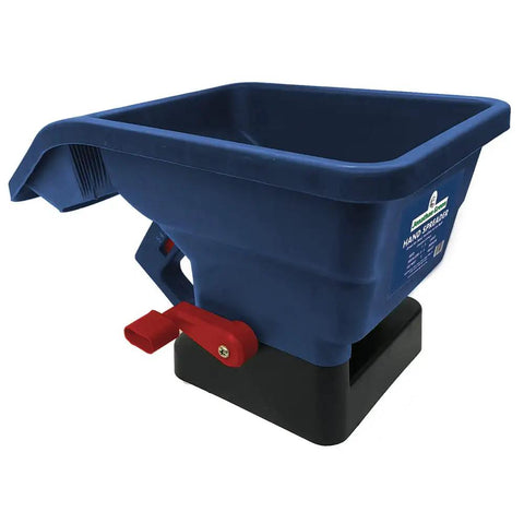Blue handheld lawn spreader for seed and fertilizer, easy crank broadcast spreader covering up to 1,500 sq ft, in side view