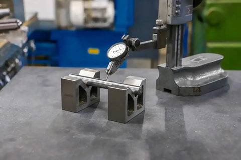 Heavy Duty Cast Iron V Block With 3-Inch Base, Precision Ground And Machined For Holding Large Workpieces At 90 Degrees During Drilling, Milling, And Grinding, 2 Pack on workbench