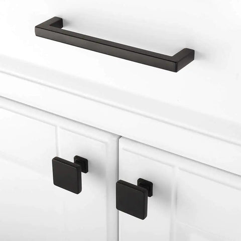 Matte Black Cabinet Knobs Set Of 10 Square Single Hole Pulls Built To Last For Kitchens And Bathrooms Durable Metal Hardware That Stays Rugged In Humid Environments Fits Standard Cabinets Easy Install. Matte black square cabinet knobs on white cabinet doors