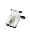 Tough As Nails Automatic Optical Lens Groover And Beveling Machine for eyeglasses, showing top view of compact white design.