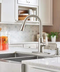 Edwyn One Handle Pulldown Kitchen Faucet With Spot Resist Stainless Finish Deck Mount 7.5 Inch Reach Pull Down Sprayer installed at a kitchen sink