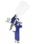 Pro Grade Mini Pneumatic Spray Gun With Swappable 0.8 And 1.0 Mm Tips For Car Repair Wall Refresh And Craft Builds Delivers A Sick Finish Every Single Time - blue body, clear fluid container.