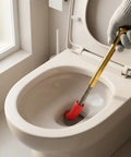 Heavy Duty Manual Toilet Auger Six Foot Steel Drain Snake with Long Handle in toilet for clearing clogs.