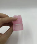 Pink Ding Ding Fidget Slider For Adults Kick Stress To The Curb With This Grab And Go Everyday Carry Gadget Featuring A Sick Clicky Pei Build And Soothing Haptic Feedback Anxiety Relief Pocket Toy held in hand, showing compact PEI design.