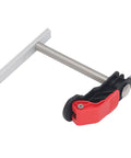 Two Pack Stainless Steel Hold Down Clamp With Quick Release for woodworking and drilling tables, red handle visible.