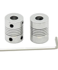 Front view: two silver aluminum flexible shaft couplings for 5–8 mm shafts, four set-screw holes, hex key