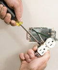 Man using Eight Piece Precision Screwdriver Set With Magnetizer Made In USA Includes Phillips 0, 1, 2 And Slotted Sixteenth Inch Bits