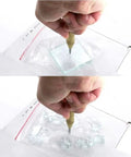 Demonstration of Five Piece Automatic Center Punch Kit Spring Loaded Adjustable Impact on glass, showing a hand applying pressure.