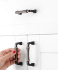 Hand installing 10 Pack 3 Inch Oil Rubbed Bronze Cabinet Pulls With Bronze Brushed Finish For Kitchen Cabinets And Drawers Durable Solid Metal