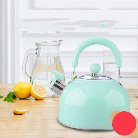 Heavy Duty Stainless Steel Water Kettle With Slick Pastel Exterior And Zero Scald Handles Providing A Dang Fast Boil Speed While Incorporating A Trustworthy Auto Whistle Alarm For Daily Household Prep on wooden surface with lemons.