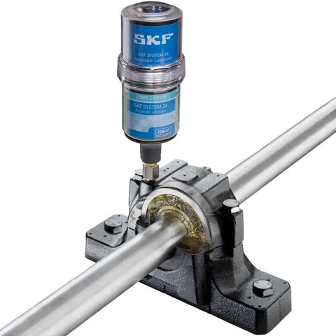 Industrial machinery with 125 Hb2 Bearing Grease Cartridge for high temp use, installed in metal bearings for lubrication