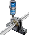 SKF automatic lubrication system with 125 Em2 Bearing Grease Heavy Duty Industrial Lubricant For Bearings And Equipment installed on machinery.