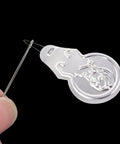 Close-up of gourd-shaped retractable threader from 40Pcs Aluminum Needle Threader Set, Handy Must Have Household Sewing Accessories For Quick Threading Through Needle Holes.