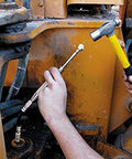 Grease Joint Rejuvenator Kit being used on yellow construction equipment with metal fittings