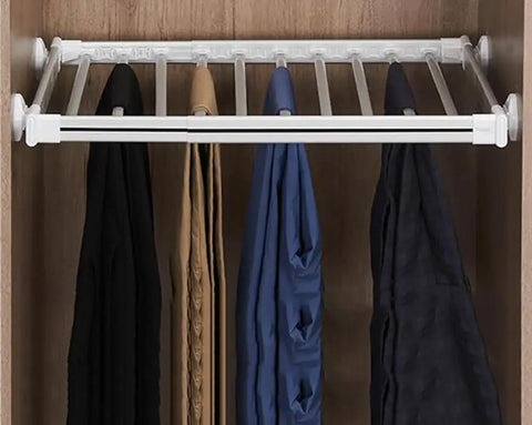 Top Shelf Multi Layer Closet Rack And Ultra Smooth Slide Out Pants Hanger For Jeans Ties Scarves Seamless Drawer Organizer space-saving rack with pants in closet.