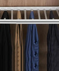 Super Slick Drawer Clothes Hanger Rack For Closet Organization With Breezy Slide Out Pants Tray Nifty Multi Layer Trouser Holder saves space with hanging trousers in a closet.