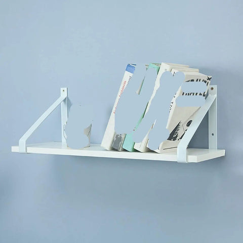 Heavy Duty Corner Shelf Brackets Set Of Two Badass Solid White Triangle Metal Supports For Wall Mounted Floating Wood Shelves Zero Wobble Setup, displaying books on a wall shelf.