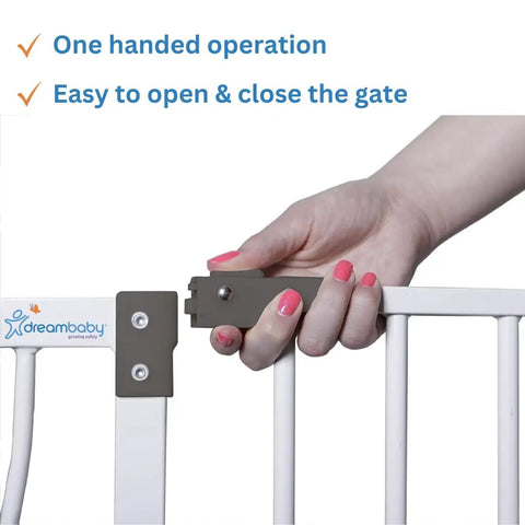 Person operating Walk Through Baby Safety Gate Set With 3.5 Inch Extension For Openings From 29.5 To 36.5 Inches, Pressure Mounted Security Gate White