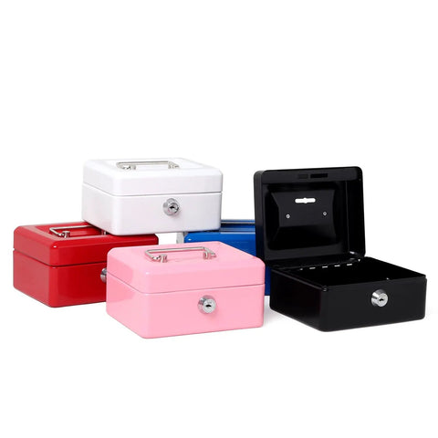 Various colored small safe boxes, including the Kid Friendly Locking Cash Box With Top Slot Pink Metal Money Safe, stacked together.