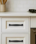 Installed 10 Pack 4 Inch Hole Center Matte Black Heavy Duty Solid Cabinet Pulls for dressers bathrooms kitchens and cabinets