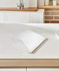 White EPE Foam Pouches Set Of 25 For Shipping Fragile Items And Glassware on kitchen countertop