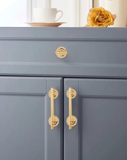 2 Pack 5 Inch Self Stick Cabinet Handles With Adhesive Gold Metal Drawer Pulls for cabinets, installed on gray cabinet