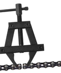 Heavy Duty Motorcycle Chain Tensioner Chain Adjuster Tool on bike chain, showcasing durable metal design for easy tensioning.