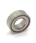 Close-up of a single metal bearing from 10 Pack Metal Upgrade Bearings 4x7x2mm For RC Crawlers, Smooth Spin And Low Friction Drivetrain Upgrade.