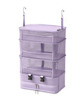 Heavy Duty Hanging Travel Shelf Bag Organizer For Luggage Suitcase With Ventilated Mesh Pockets And Water Repellent Nylon Fabric in purple.