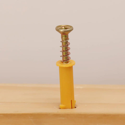 Built Like A Tank 50 Piece Concrete Drywall Anchor Set With Rock Solid Plastic Expansion Sleeves And Razor Sharp Self Tapping Flat Head Screws, yellow plastic plug and screw detail.