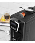 Kickstart Your Daily Grind With This Total Game Changer Black Espresso Machine with Nespresso pod, digital display and sleek design.