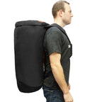 Side view of person wearing Mesh Duffel Backpack Dive Bag With Dry Pocket For Scuba And Snorkeling Black Large 29 By 15 By 15 Inches